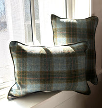 Blue/brown plaid pillows with piping. Solid linen on the back. 14x22